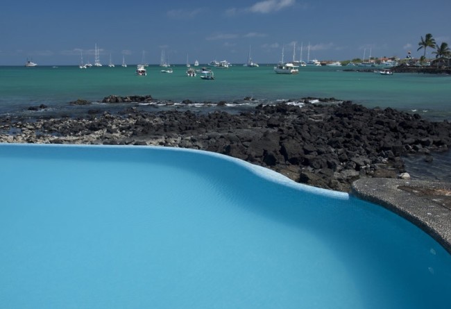 Blue Pool, Crystal Clear Ocean Waters And Boats Docked At Puerto Ayora, Santa Cruz Island,Galapagos Archipelago, Ecuador , South America